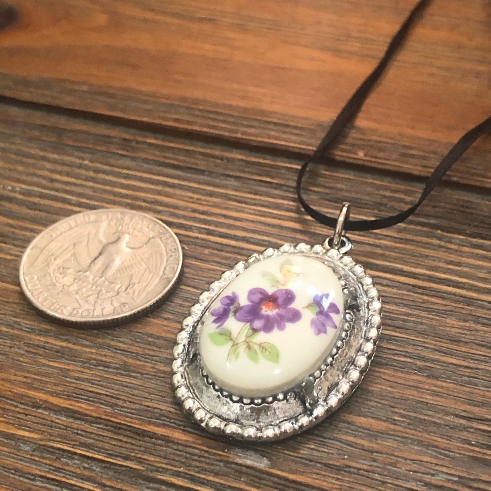 Silver tone and ceramic pendant